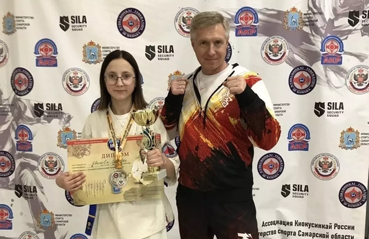 Елизавета Иванова вместе с тренером Андреем Ковалёвым.